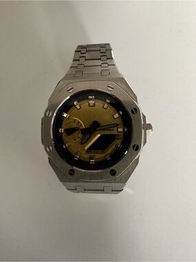 G-Shock Silver Watch with Gold Dial